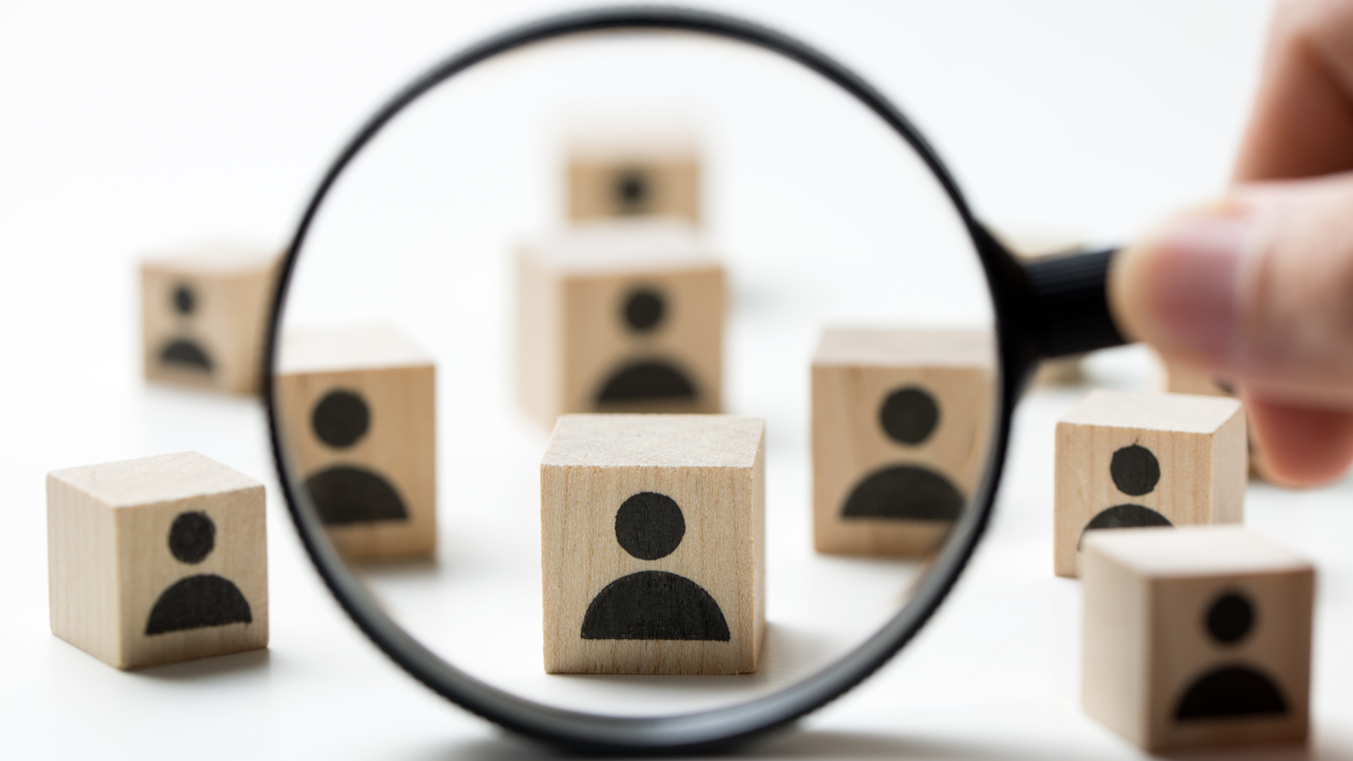 Alabama Hourly Employees Survey - graphic of magnifying glass hovering over icons of people.