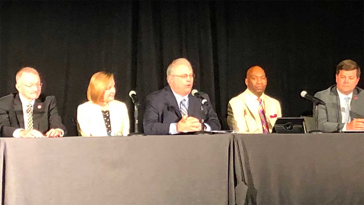 panel of speakers at conference