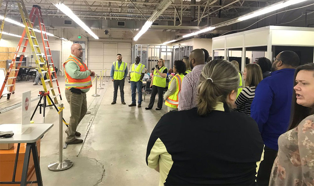 Tour group from educator workforce academy