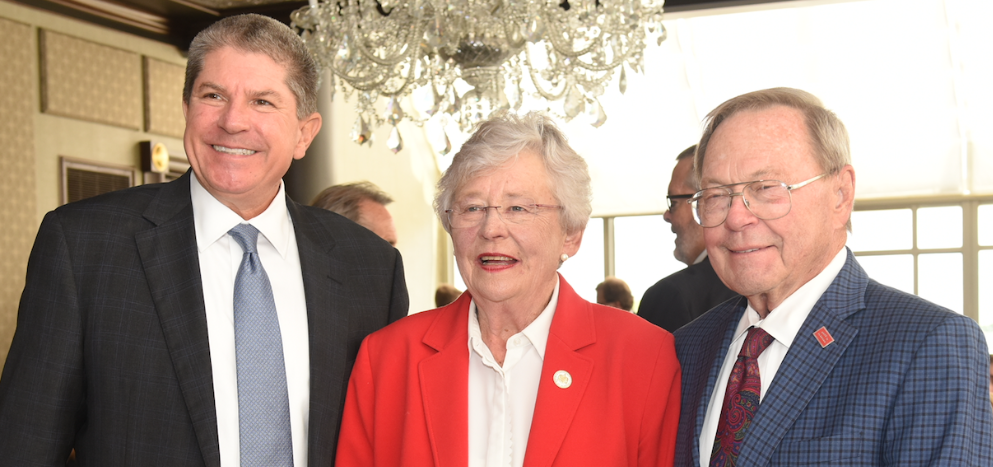 Governor Ivey poses for picture with Zeke Smith and George Clark