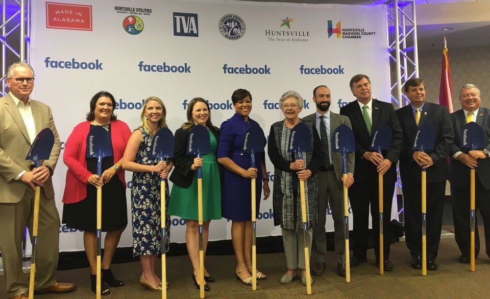 Group poses for image at Facebook groundbreaking event
