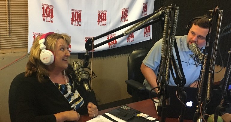 Mikki Ruttan talking on a radio show